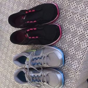 Nike 2 pair women's size 12. One black and pick. One blue, gray and green.